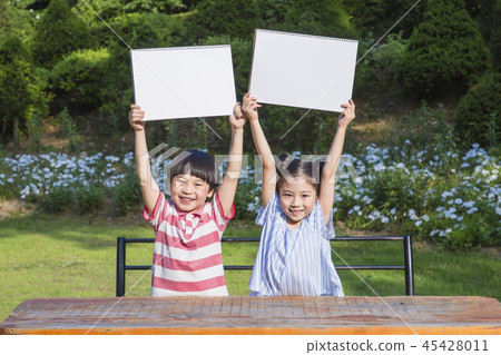 Cute little boy and girl harvesting together. Gardening, planting concept photo 332 45428011