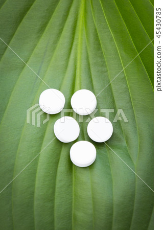 Health care items concept photo. Skin care, medical elements, pharmacy and drug capsule. 218 45430785