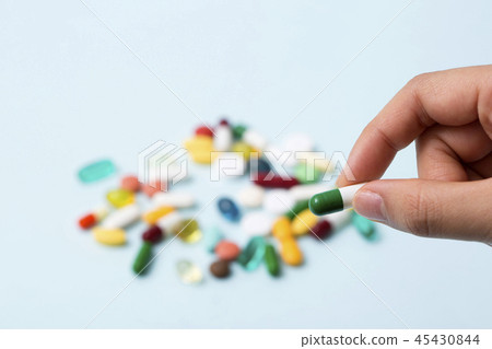 Health care items concept photo. Skin care, medical elements, pharmacy and drug capsule. 210 45430844