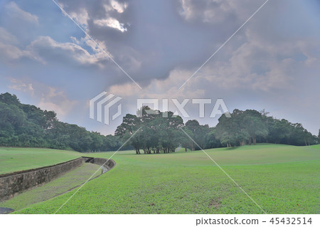 Green golf course cart path in cloudy Green golf course cart path in cloudy 45432514
