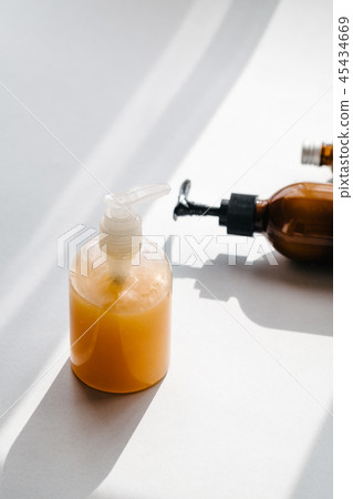 Bottles with organic cosmetics overhead 45434669