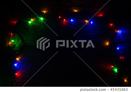Lights of a New Year garland on a black background 45435863