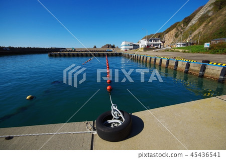 Buoy and old tires in the fishing port 45436541