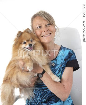 pomeranian and woman pomeranian and woman 45438531
