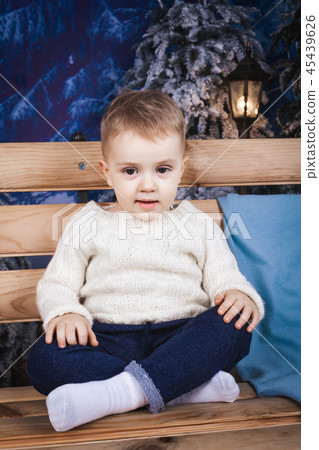 toddler sitting on the bench toddler sitting on the bench 45439626