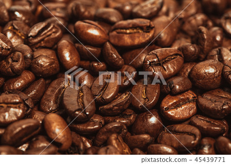 Dark many roasted coffee beans texture background 45439771