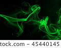 Green smoke abstract on dark background 45440145