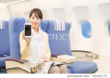 飛機飛行旅行婦女智能手機wifi 45441172