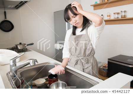 Young housewife disgusted with washes 45442127