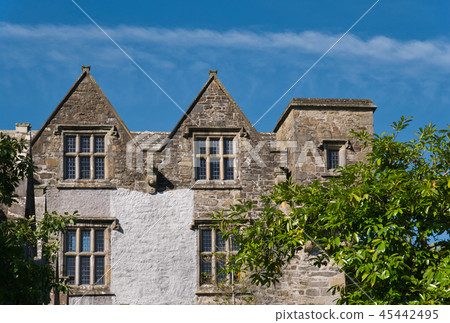 A facade with window of the Donegal Castle A facade with window of the Donegal Castle 45442495