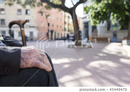 old man with a walking stick 45449478