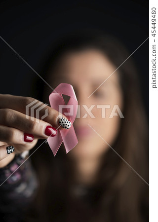 young woman with a pink ribbon 45449480