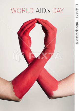 red ribbon and text world aids day 45449491
