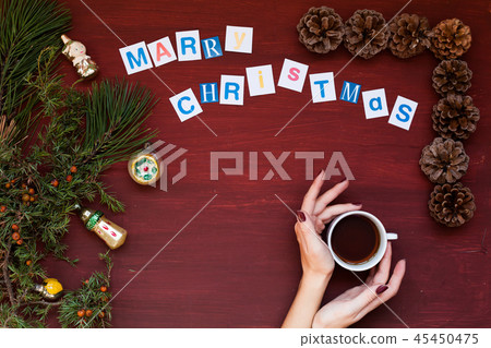 women's hands Christmas background new year tree gifts toys vacation women's hands Christmas background new year tree gifts toys vacation 45450475