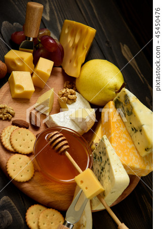 slices of cheese brie or camembert with croissants slices of cheese brie or camembert with croissants 45450476