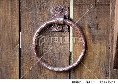 Old door handle in the form of a ring Old door handle in the form of a ring 45451974