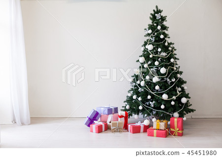 Christmas home decor with Christmas tree and gifts new year holidays Christmas home decor with Christmas tree and gifts new year holidays 45451980
