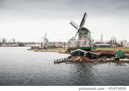Netherlands, Windmills on Zaan river coast 45453009