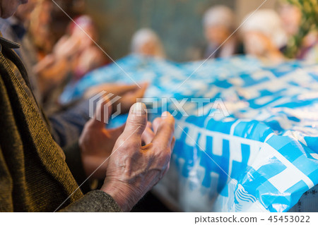 Muslim man hands praying for the salvation of the soul 45453022
