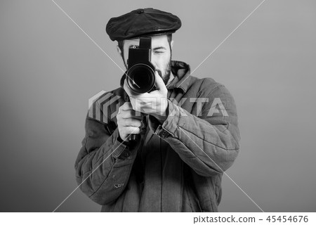 Concept - cinema industry. Cameraman, retro camera 45454676