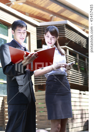 businessman and businesswoman 45457485