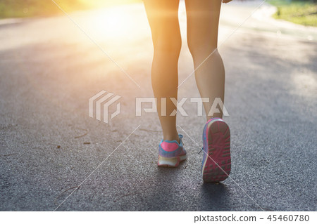 Runner woman running in the garden 45460780