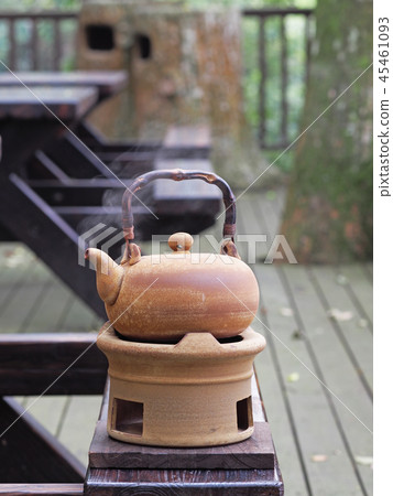 Old kettle put on a fireplace 45461093