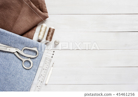 Sewing items on the light wooden table Sewing items on the light wooden table 45461256