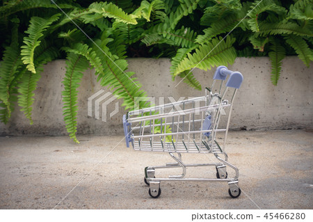 Mini shopping cart, Sale and e-commerce concept Mini shopping cart, Sale and e-commerce concept 45466280