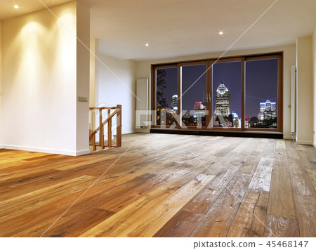 Room interior with wooden floor and view on nig 45468147