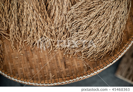 Thai rice paddy on wickerwork Thai rice paddy on wickerwork 45468363