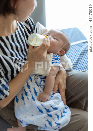 Breastfeeding newborn and mother Breastfeeding newborn and mother 45470019