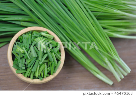 beautiful green onion chives on background. 45470163