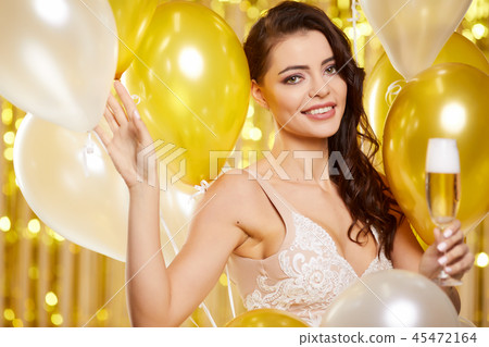 girl in evening dress with champagne glasses girl in evening dress with champagne glasses 45472164