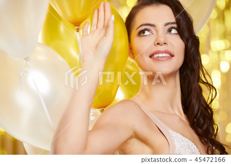 Beauty woman in gold dress . new year concept Beauty woman in gold dress . new year concept 45472166
