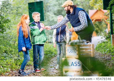Delighted nice blonde boy receiving a medal Delighted nice blonde boy receiving a medal 45476546