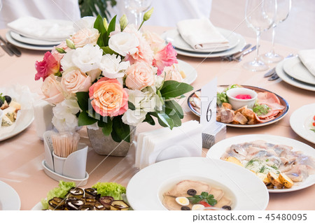 Served for banquet restaurant table with dishes Served for banquet restaurant table with dishes 45480095
