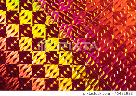 Texture of red foil with holographic effect. Christmas background. Texture of red foil with holographic effect. Christmas background. 45481988