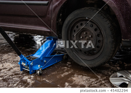 car jack up for lifting wheels, auto repair car jack up for lifting wheels, auto repair 45482294