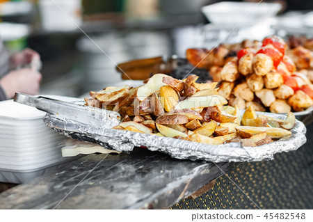 Baked potatoes in foil Baked potatoes in foil 45482548