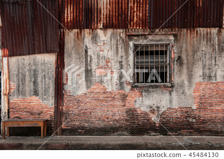 Old grunge timeworn brick wall and window Old grunge timeworn brick wall and window 45484130