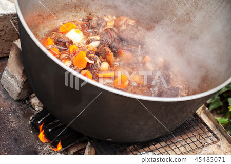 Lamb with carrot and onion stew in pan Lamb with carrot and onion stew in pan 45485071