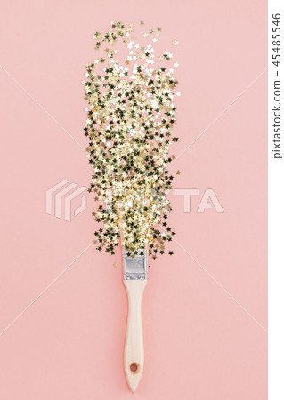 Surreal Paint brush drawing golden stars confetti 45485546