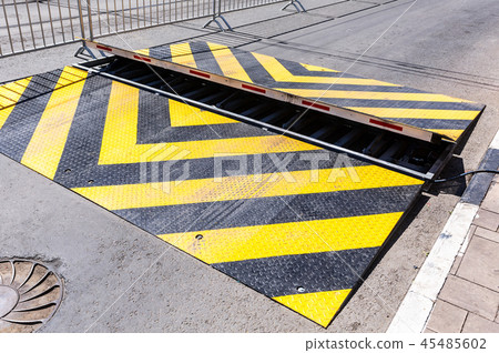Road barrier with yellow and black striped  Road barrier with yellow and black striped  45485602