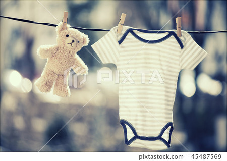 Baby girl and boy body and teddy bear 45487569