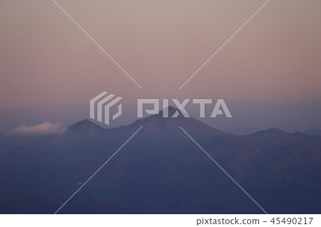 Smoke from the main mountain hut right below the summit of Tohoku Itoyoyama mountain Smoke from the main mountain hut right below the summit of Tohoku Itoyoyama mountain 45490217