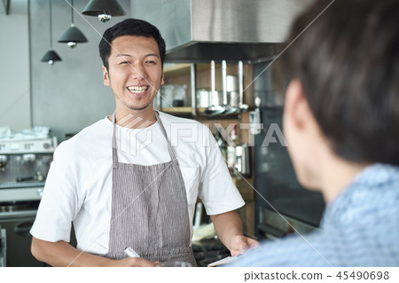 Staff working at a cafe 45490698