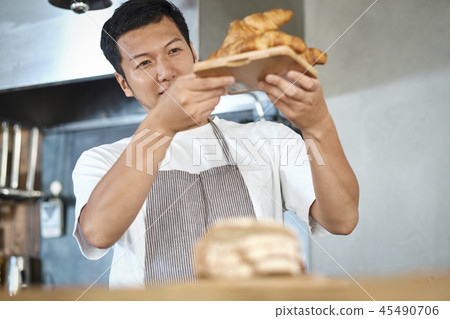 Staff working at a cafe Staff working at a cafe 45490706