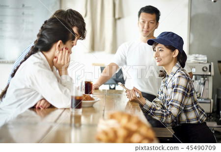 A couple to relax at a cafe A couple to relax at a cafe 45490709