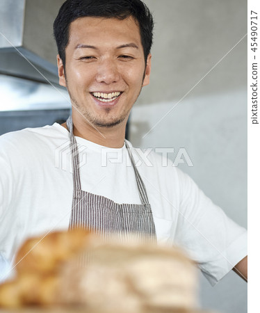 Staff working at a cafe Staff working at a cafe 45490717